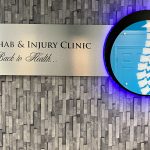 dema rehab injury clinic sign
